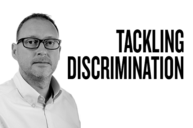 Black and white photo of Peter Rainey, Design102 MD, against a white background with the title Tackling Discrimination