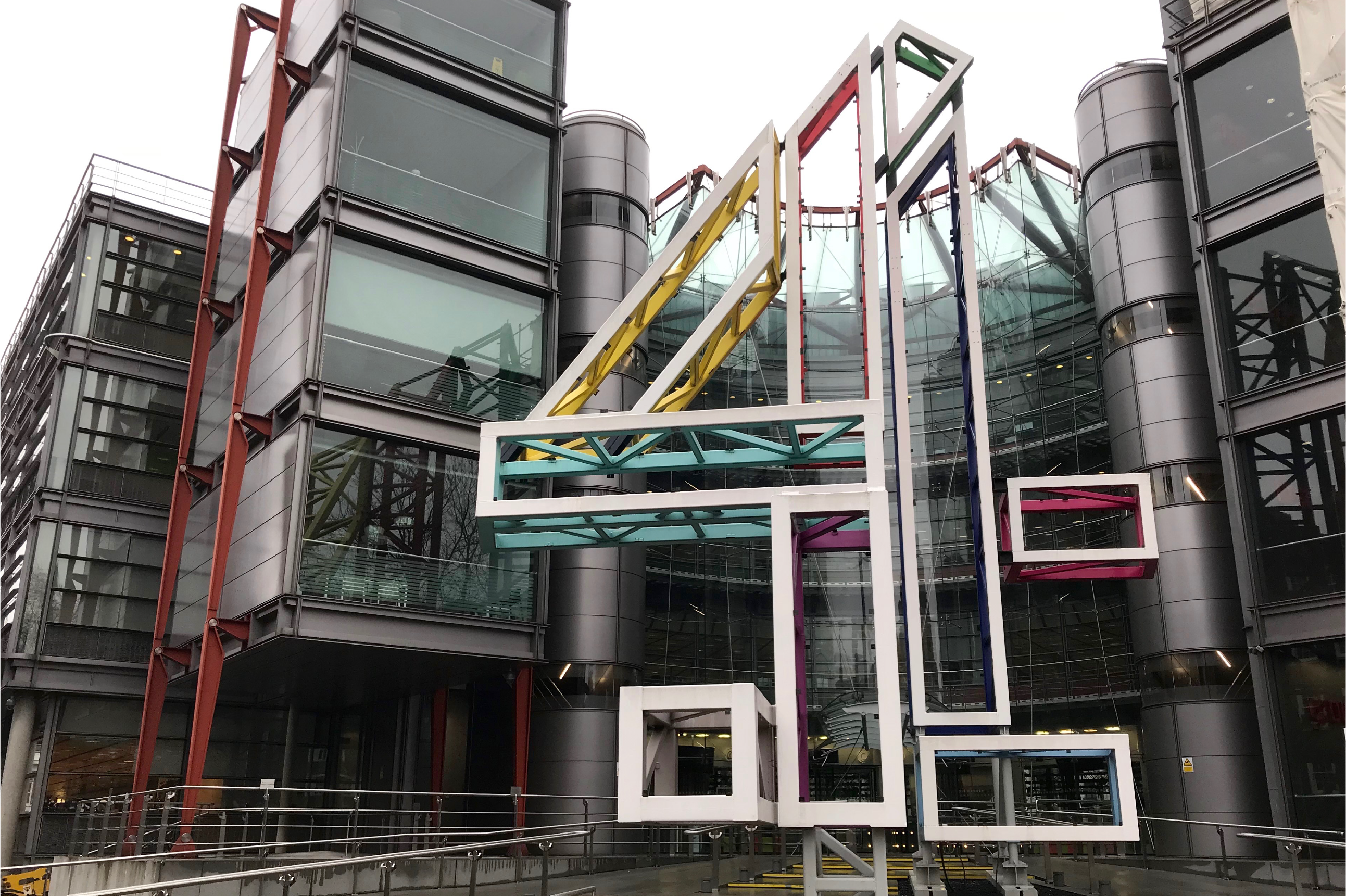 A three-dimensional Channel 4 logo outside the offices in London.