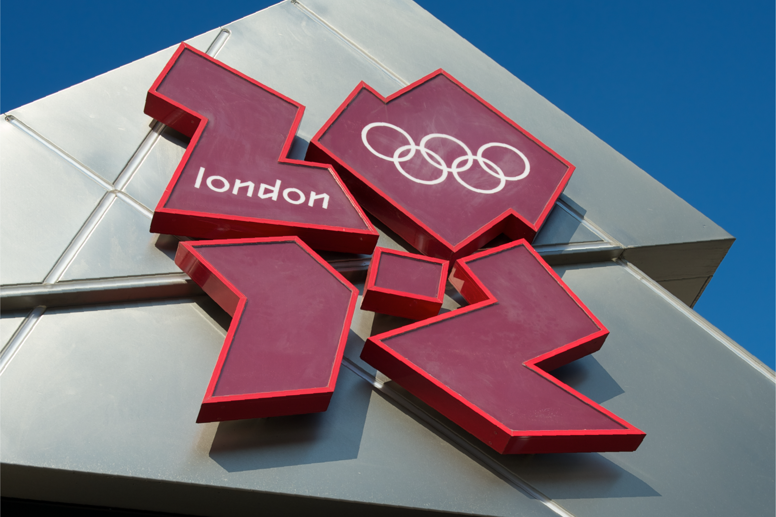 A three-dimensional London 2012 Olympics logo on the side of a building.