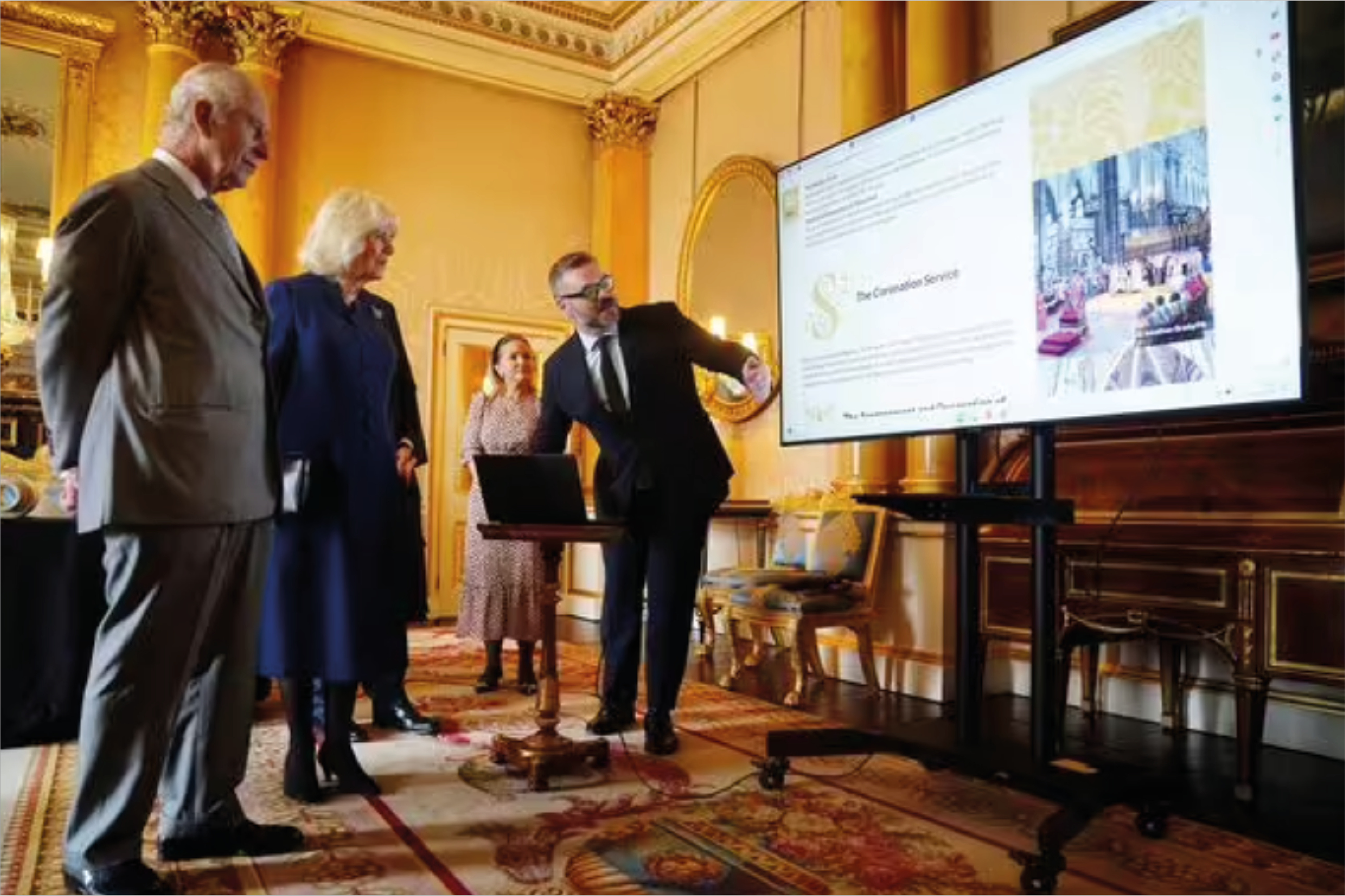 A presentation displaying the new Coronation roll website to King Charles III and Queen Camila